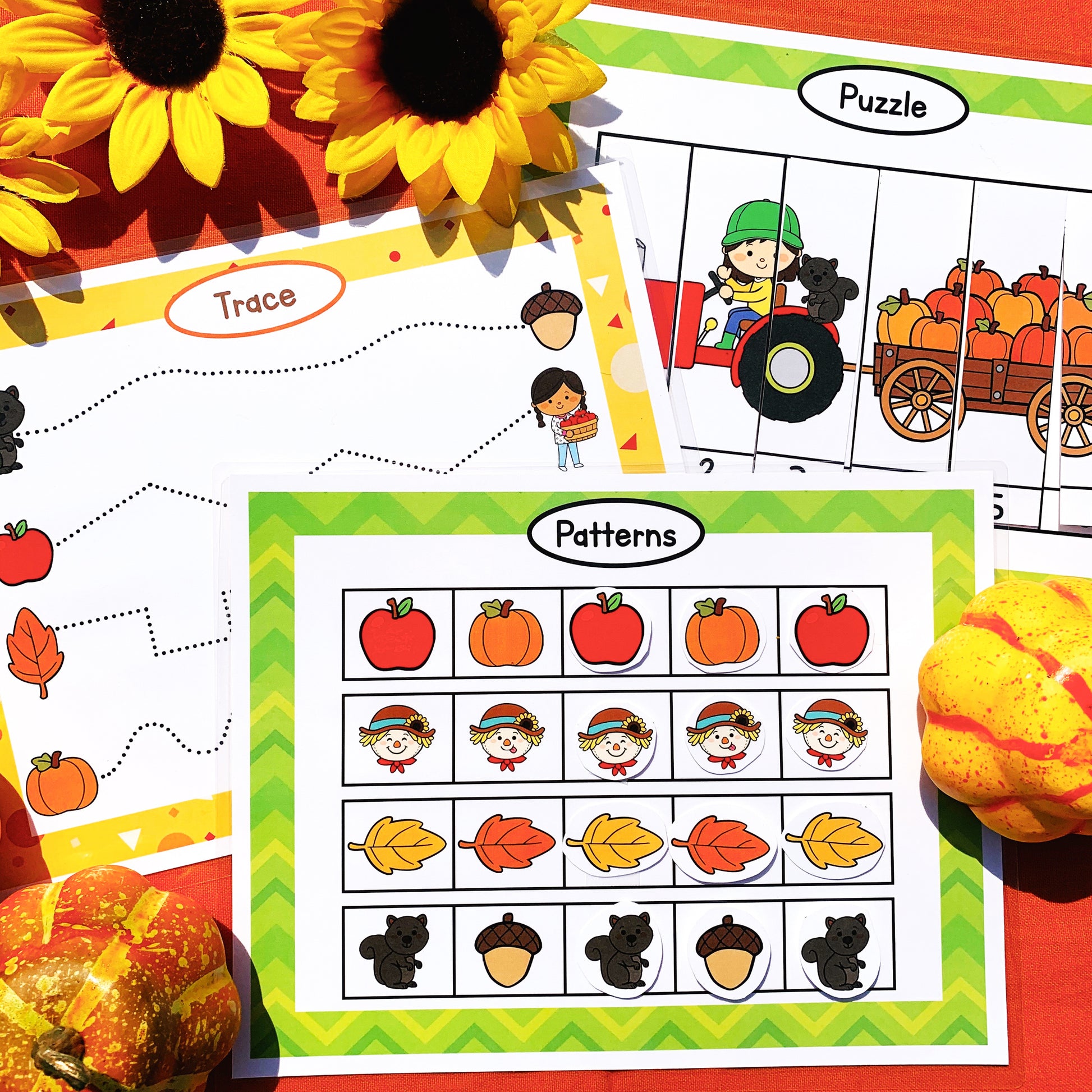 13 fall learning activities for your preschooler in this fall printable busy book! Includes 20 printable pages that include these activities 1. colors 2. emotions 3. clothes for fall 4. shapes 5. sizes 6. letters - uppercase 7. patterns 8. puzzle 9. name 10. trace lines 11. categorize 12. Itsy Bitsy Spider song 13. play dough mat